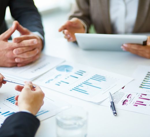 Business meeting with data analysis